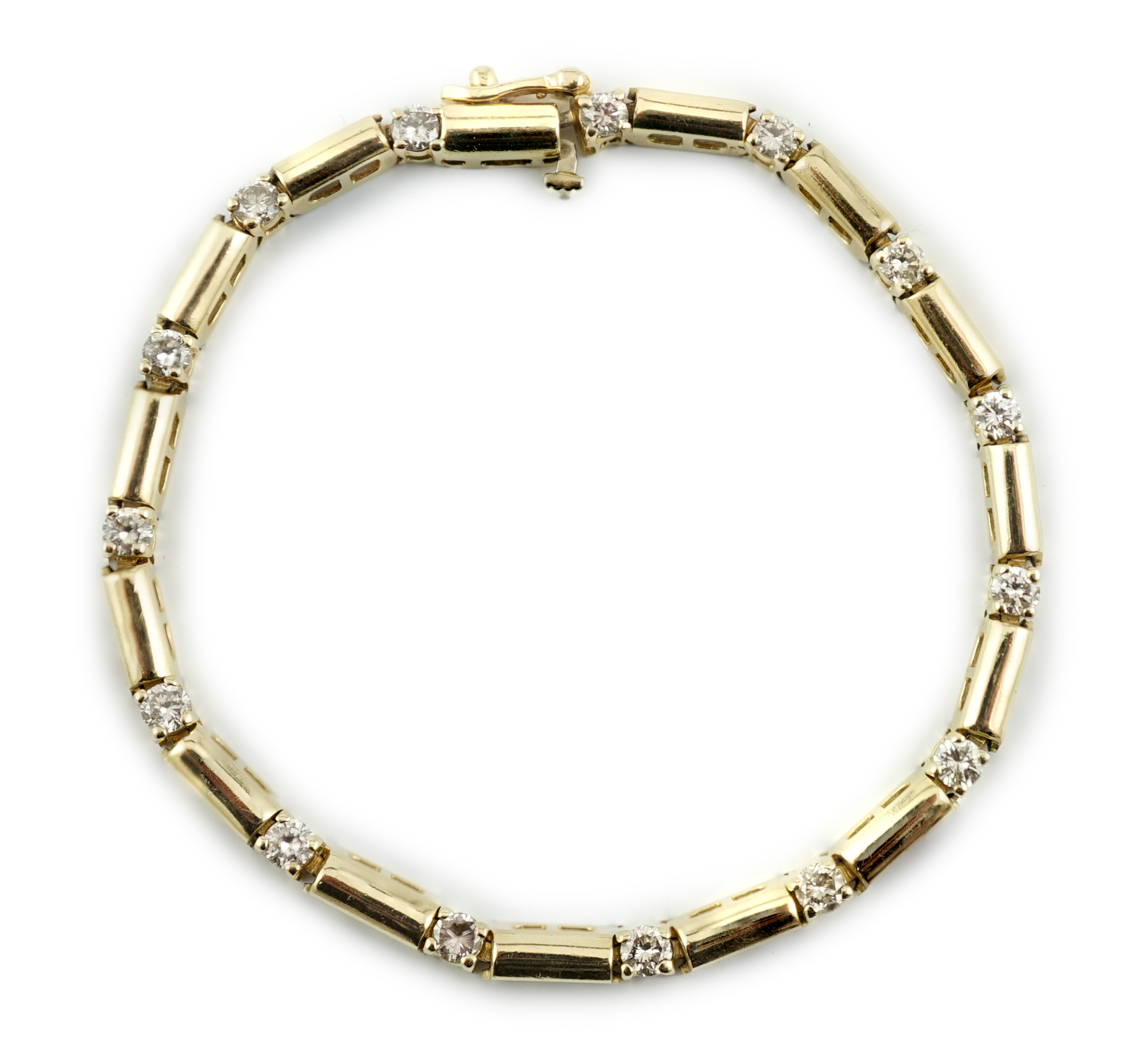 A modern 14k gold and fifteen stone diamond set line bracelet